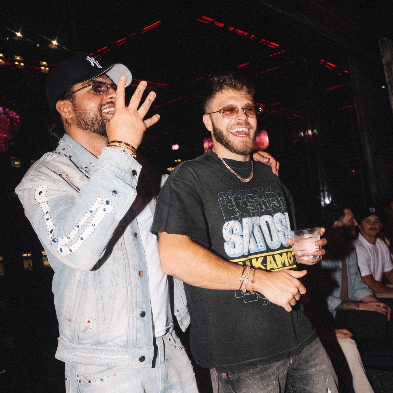 David Chaboki (Shibo) and Christian Barker (Bark) laughing together at a DDNYC 2026 nightlife club in New York